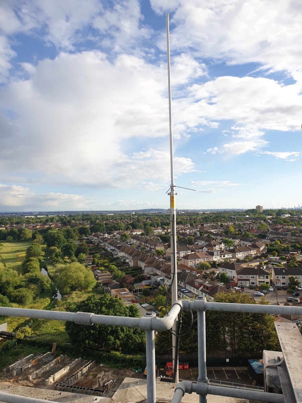 The GB7HH antenna on the rooftop, looking out over Romford towards the London skyline